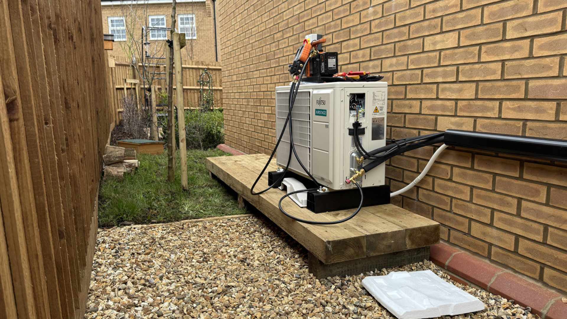Hand turning on air con unit